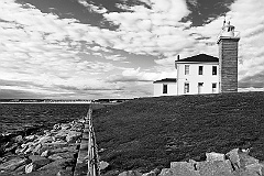 Watch Hill Light Protected by Rocks and Seawall - BW